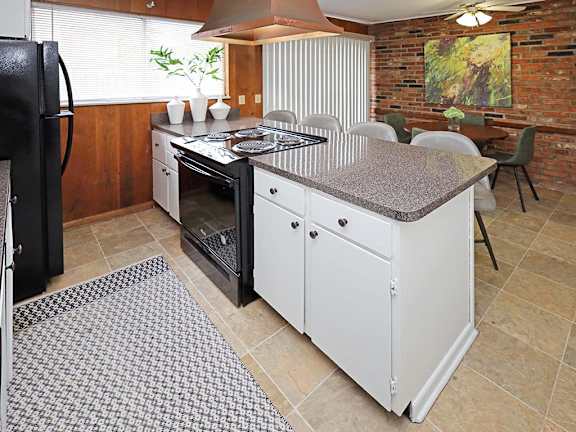 Model Kitchen and Dining Area at Colonial Park Townhomes in Euclid OH