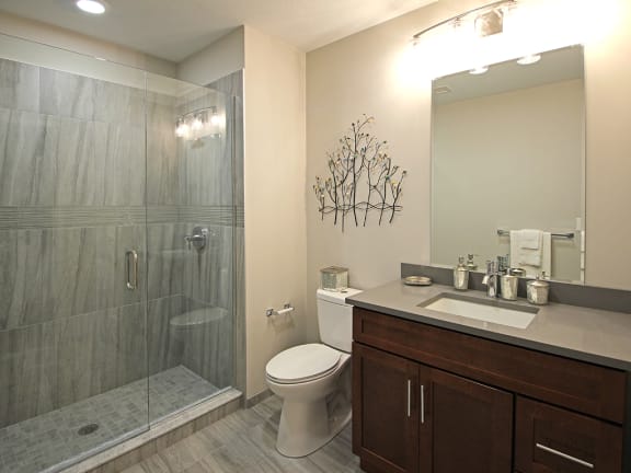 Ceramic Tile Floors &amp; Quartz Countertops in Bathrooms at The Terminal Tower Residences Apartments, Cleveland