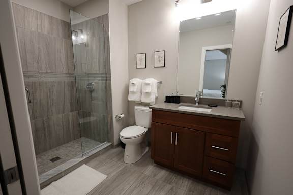 Ceramic Tile Floors with Quartz Countertops at The Terminal Tower Residences Apartments, Cleveland, 44113