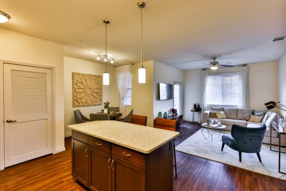 furnished kitchen with floating kitchen island at Capriana at Chino Hills, Chino Hills