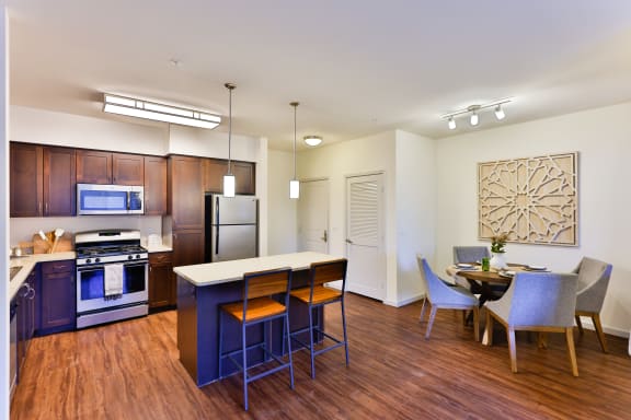 furnished kitchen with espresso cabinets at Capriana at Chino Hills, Chino Hills, California