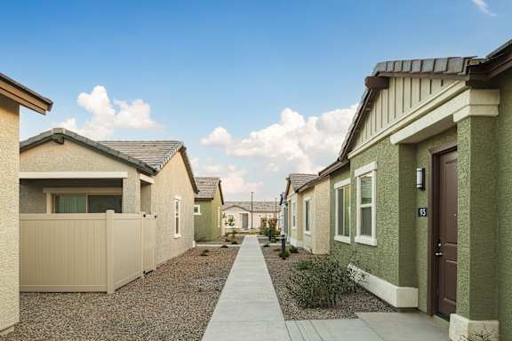 A Row of Houses with a Sidewalk at Estia Roseville, Roseville, CA