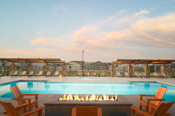 Resort style pool with firepit and lounge chairs at Estia Roseville Apartments, Roseville, 95747