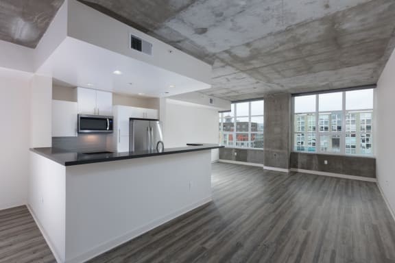 wood plank style flooring in unfurnished living room&#xA0;at Aqua Via Apartments, California, 94607