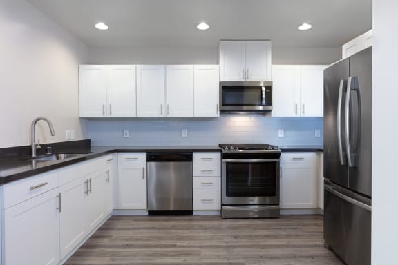 unfurnished kitchen with stainless steel appliances&#xA0;at Aqua Via Apartment, California