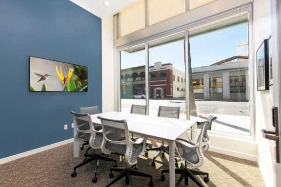 Conferene room with Wall-Mounted Flat Screen Monitor at Imperial Hardware Lofts, Riverside, CA