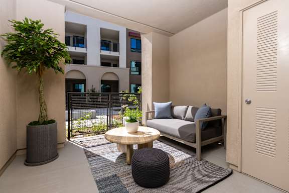 A Small Balcony With Plants at North Grove, Riverside, CA