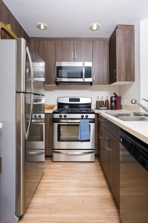 Refrigerator And Kitchen Appliances at The Preston Miracle Mile Apartments, California