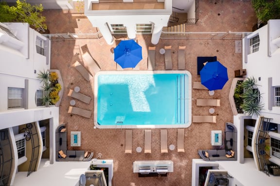 Aerial view of pool and lounge seating at The Preston Miracle Mile Apartments, Los Angeles, CA, 90036