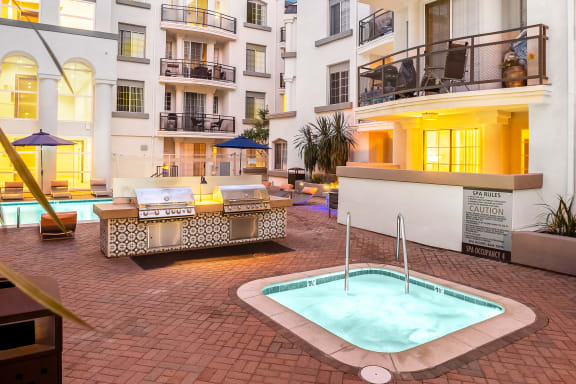 Jacuzzi with BBQ grills at The Preston Miracle Mile Apartments, California