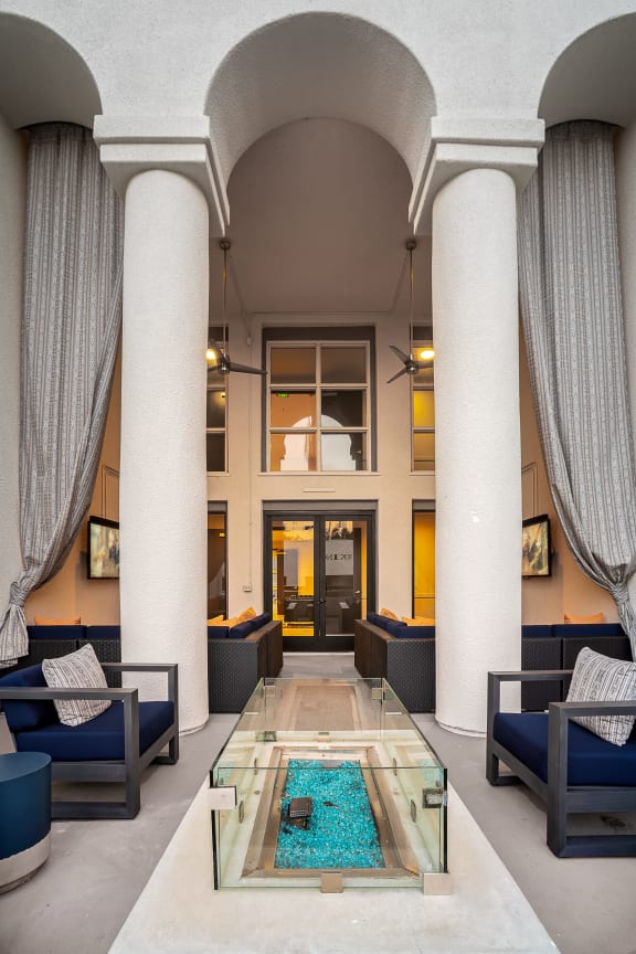 Firepit and lounge seating at The Preston Miracle Mile Apartments, Los Angeles, CA, 90036