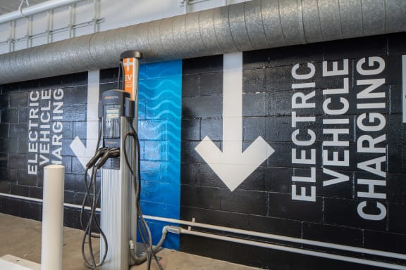 Electric vehicle charging point at The Preston Miracle Mile Apartments, Los Angeles, CA
