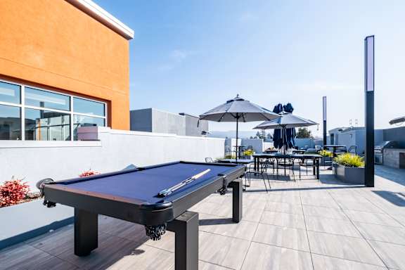 Rooftop deck with pool table and bbqs
