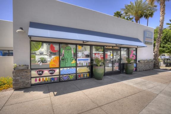 the outside of a store with a window display of fruit and vegetables at Vaseo Apartments, Phoenix