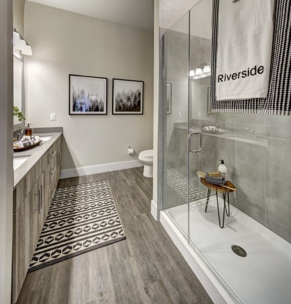 Renovated Bathrooms With Quartz Counters at Arise Riverside, Texas