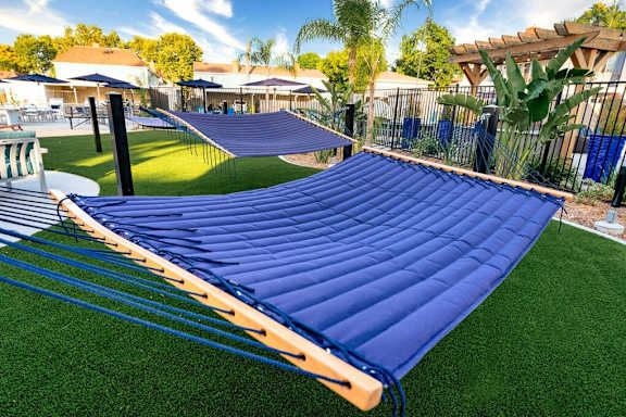 Blue Slide in a backyard at Nola 624 Apartments, California, 91790