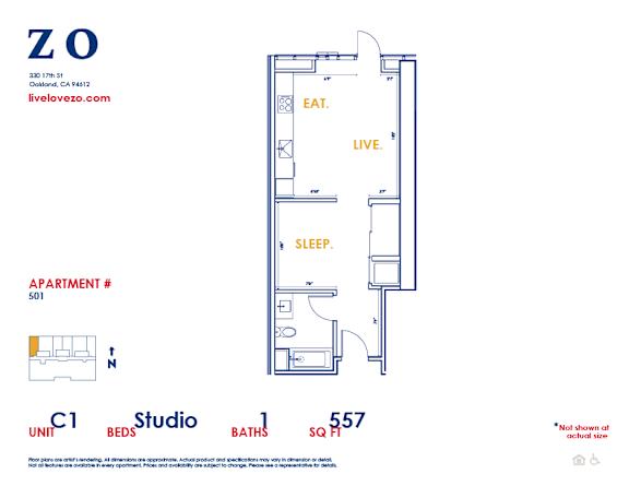 A floor plan of a studio apartment with a bed, a desk, a couch, and a kitchenette.