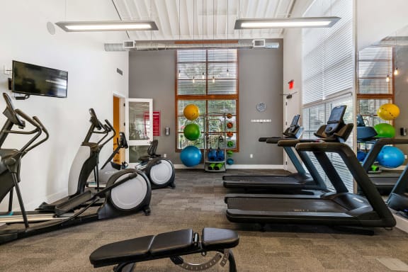a gym with treadmills and other exercise equipment at Mullan Reserve Apartments, Missoula, 59808