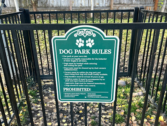 Pet friendly dog park with posted regulations at Mullan Reserve Apartments, Montana, 59808