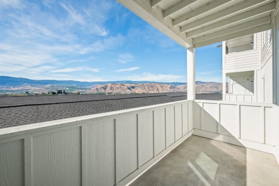 the view from the balcony of a house overlooking the mountains at Gateway Apartments, East Wenatchee ,Washington, 98802