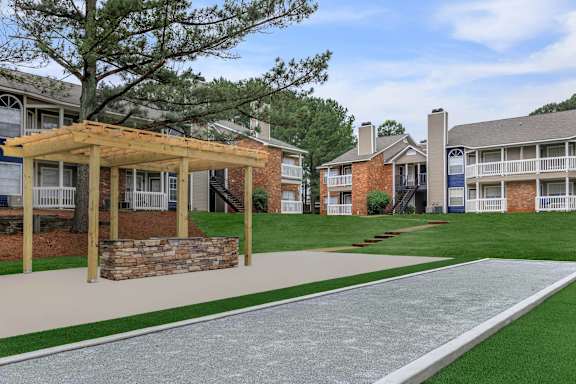 our apartments are centrally located in the community with a walkway and grass