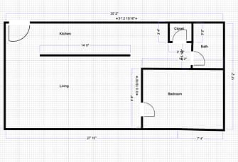 A floor plan of a house with a kitchen, living room, and bedroom.