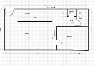 A floor plan of a house with a kitchen, living room, and bedroom.