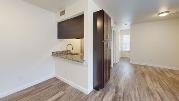 a kitchen and dining area in a 555 waverly unit at Bennett Ridge Apartments, Oklahoma City, OK