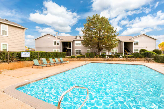 Image of a pool with furniture at Bennett Ridge Apartments, Oklahoma City, Oklahoma
