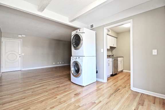 A laundry room with a washer and dryer.