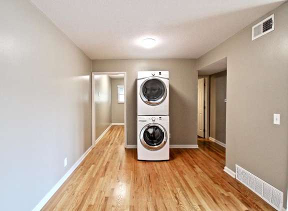 A laundry room with a washer and dryer.