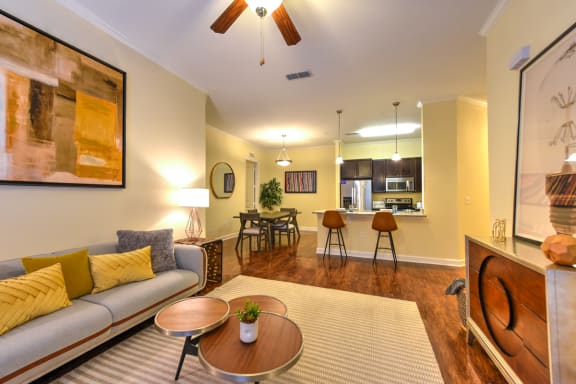 Living Room with a Grey Couch at Alaqua, Jacksonville, FL