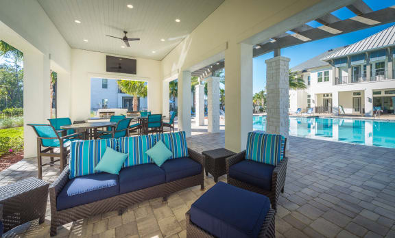 Pool pavilion with comfy seating  at Alaqua, Florida, 32258