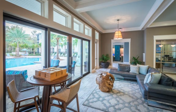 Clubroom with shuffeboard at Alaqua, Jacksonville, FL