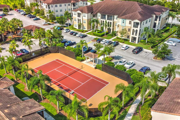 an aerial view of a tennis court in the middle of a street  at Hacienda Club, Florida, 32256