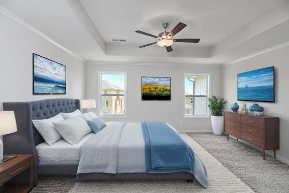 A bedroom with a bed, a dresser, and a ceiling fan.