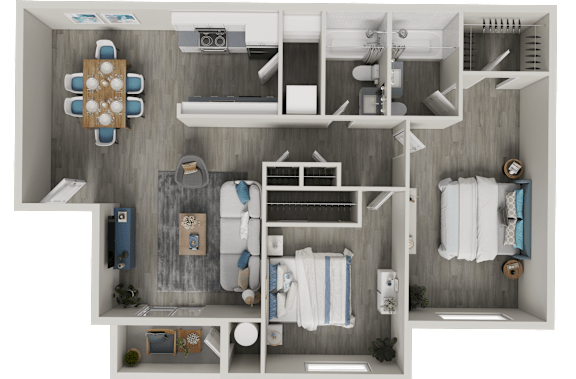 A top-down view of a small, neatly organized bathroom with a toilet, sink, and towel racks.