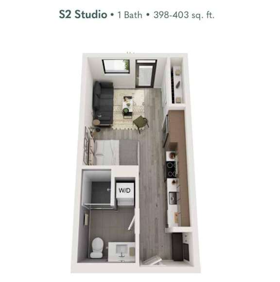 A small studio apartment with a bathroom and a bed.