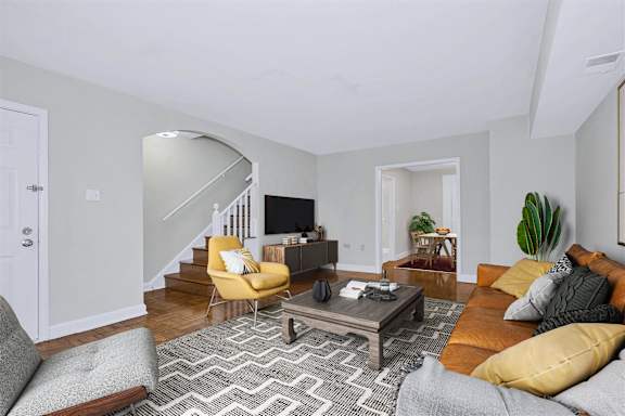 a living room with a couch and a coffee table