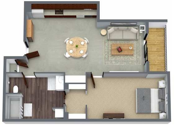 A top-down view of a living room with a dining area, kitchen, and staircase.