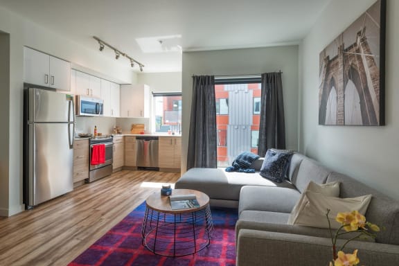 a living room with a couch and a table at Wilcox, Seattle, Washington
