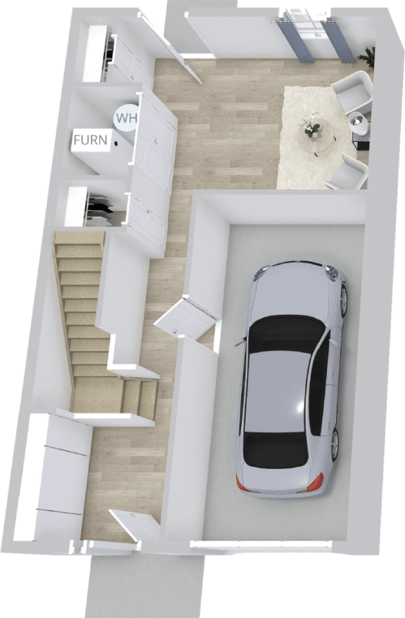 an overhead view of a white car parked in a garage