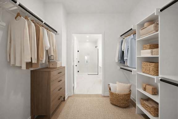A hallway with a white door and a carpeted floor.