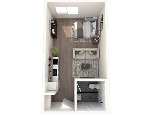 A small room with a bed, a desk, and a chair.
