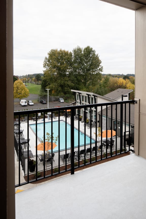 a view of the pool from the balcony