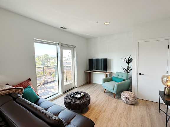 Living room with TV at Cannery Flats, Bozeman, Montana