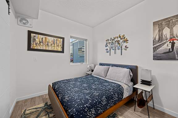 bed with two pictures on the wall at Majestic Drive, Montana, 59808