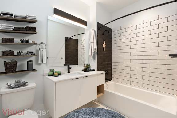 Bathroom with White Tub and Sink at Cannery Flats, Bozeman, MT
