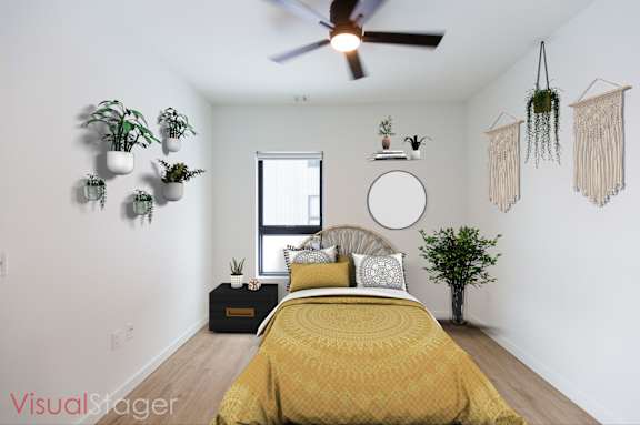 Bedroom with ceiling fan at Cannery Flats, Montana