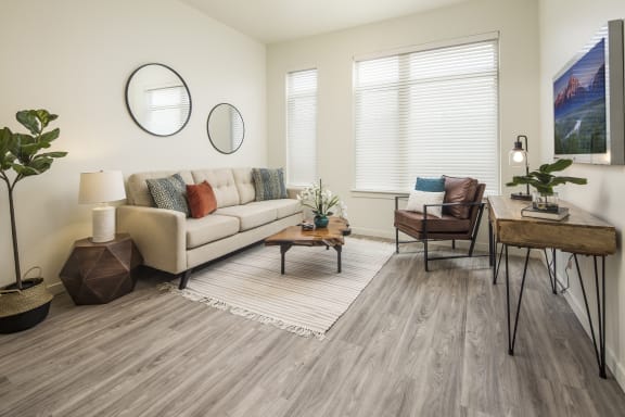 a living room with a couch and a table